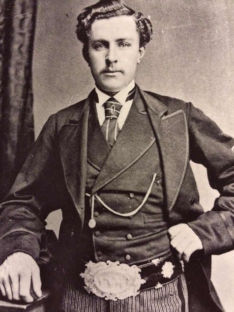 Young Tom Morris and The Challenge Belt. Photo Credit: The Scottish Golf Book.