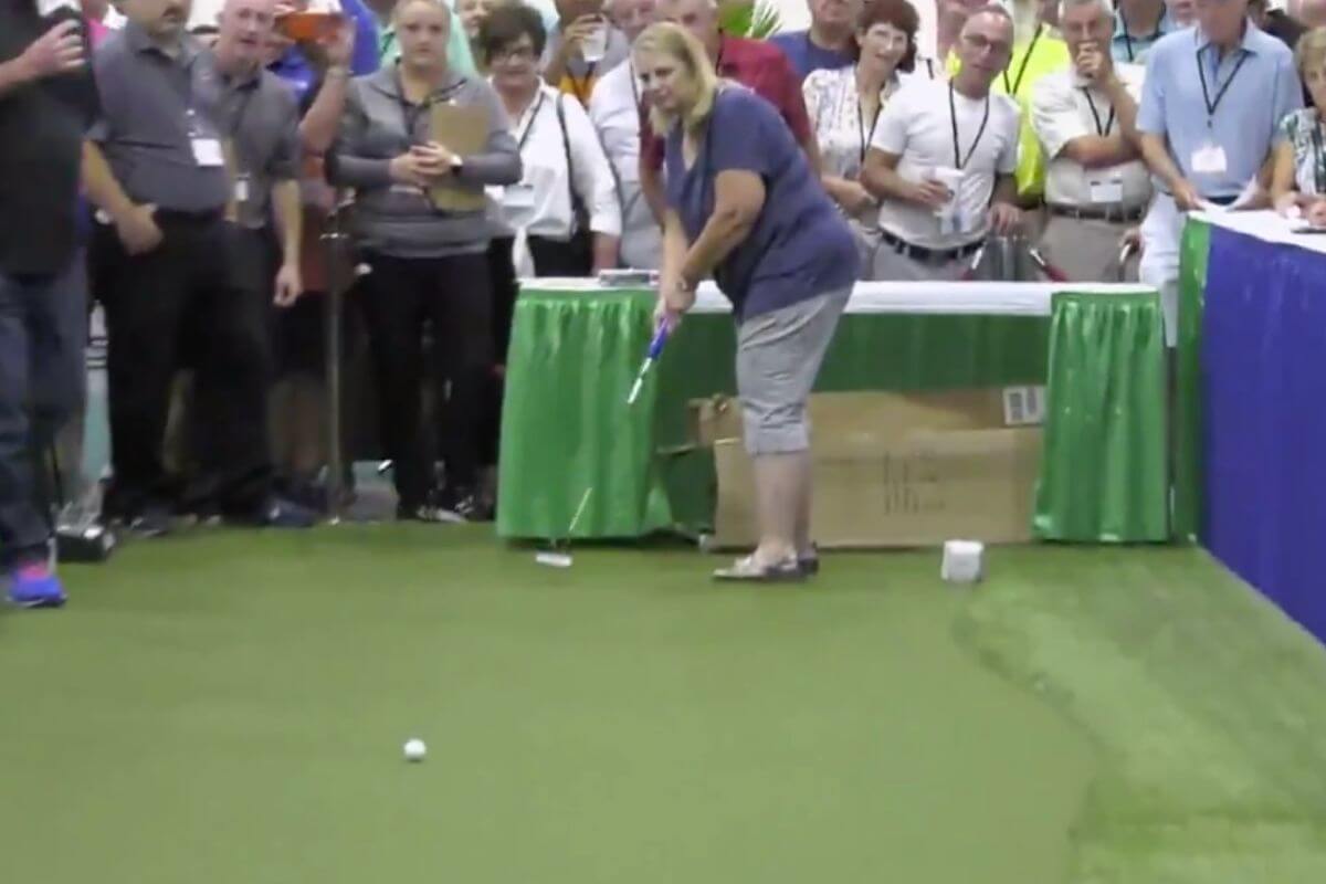 Woman Wins 25000 on 100 foot putt